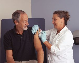 Nurse administers a vaccine