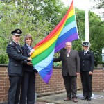 Raising the Pride flag (from left): Chief fire officer Des Prichard, East Sussex County Council chief executive Becky Shaw, Cllr Colin Belsey and deputy chief constable Olivia Pinkney