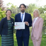 ESCC DofE Programme Co-ordinator Catherine Corfield (left) and Louise Carter receiving their DofE Licensed Organisation plaque from Alistair McGowan.