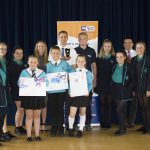 Josh Hayler, apprentice (centre, black shirt), with Hannah Hayler, Rob Muggridge and Steve Baldry from Marshall Tufflex, winner of the SELEP best small to medium enterprise in the south east region, with students from Hastings-based ARK Helenswood Academy and ARK Blacklands Primary Academy