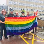 Flying the flag (from left): Steph Meech - deputy chair of Pride in SECAmb at South East Coast Ambulance Service, Chief Superintendent Neil Honnor - Sussex Police, Richard Curtin - chief operating officer at Sussex Community NHS Foundation Trust, Mark O’Brien - deputy chief fire officer for East Sussex Fire and Rescue Service, Becky Shaw - ESCC chief executive, Cllr Keith Glazier - ESCC leader