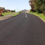 A view along Princess Drive, Seaford after surface dressing had been carried out
