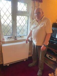 Paul in front of one of the new high retention storage heaters