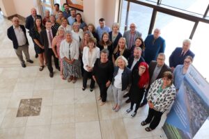 Members of Skills East Sussex come together to celebrate - a group of men and women smiling at the camera 